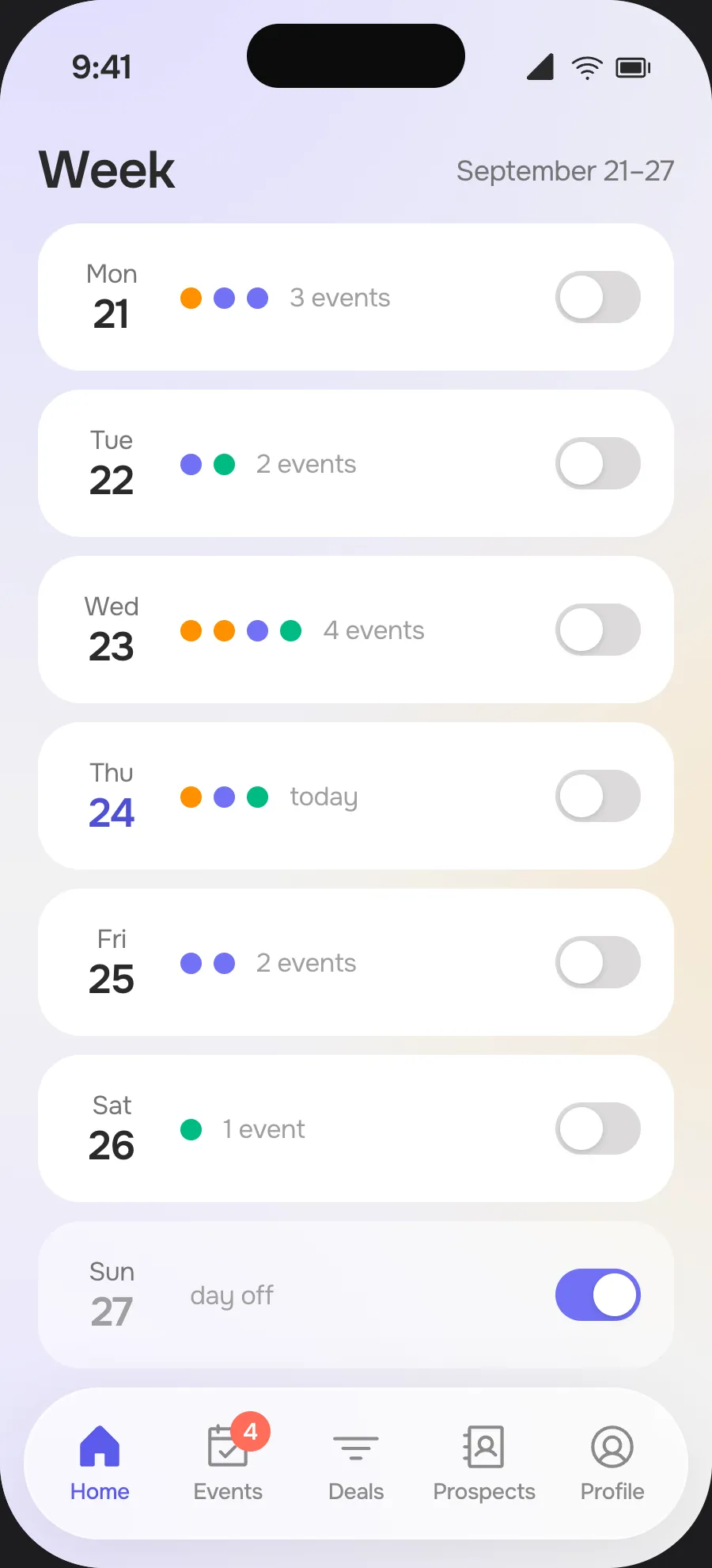 “Week” screen: days with colored event dots and a day off